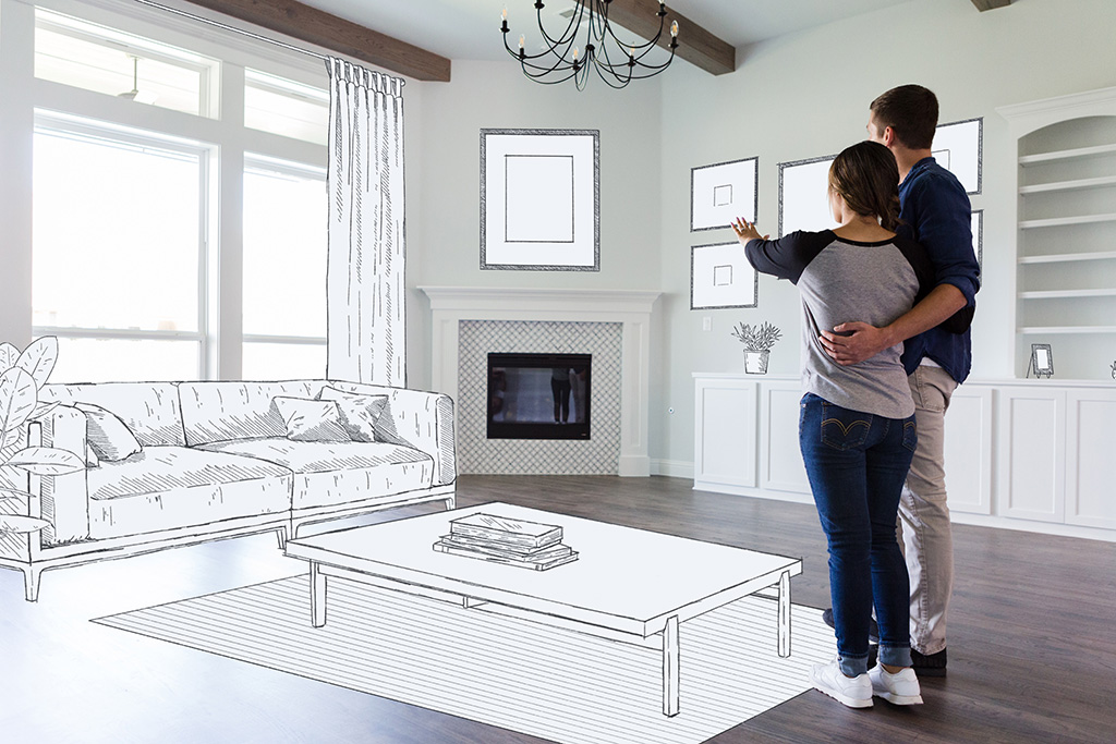 Man and woman envisioning living room design