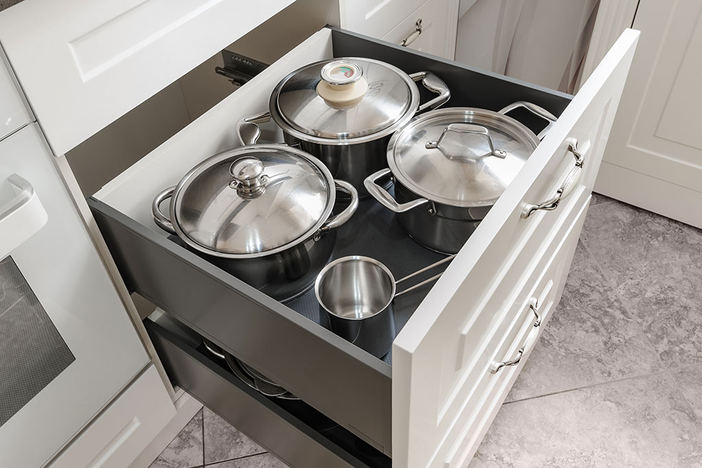 Pots and pans in kitchen drawer