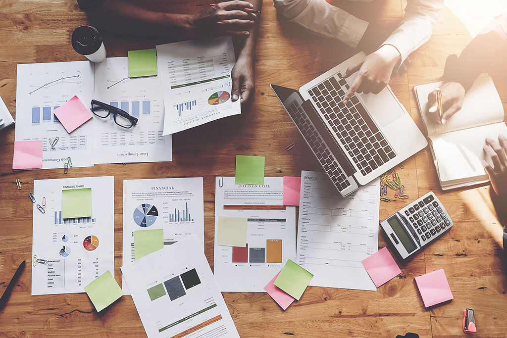 Co-workers planning marketing