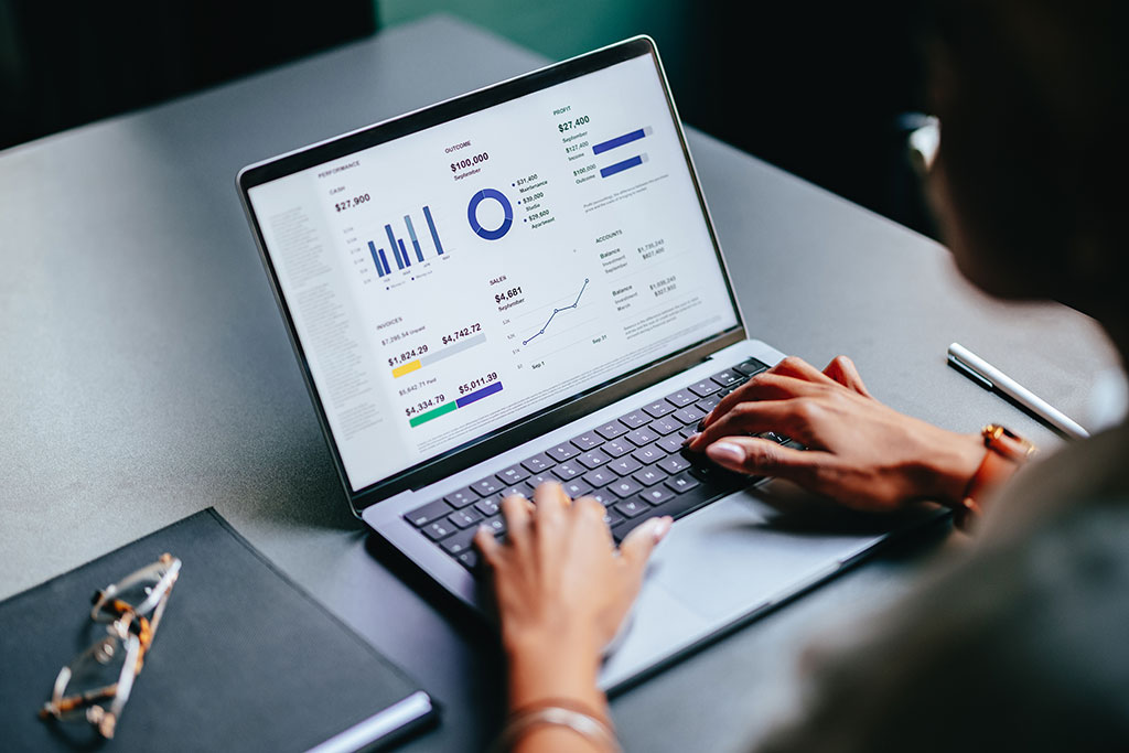 Woman using laptop at work