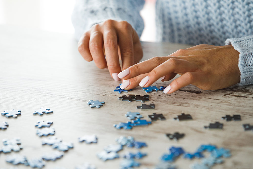 Woman doing puzzle