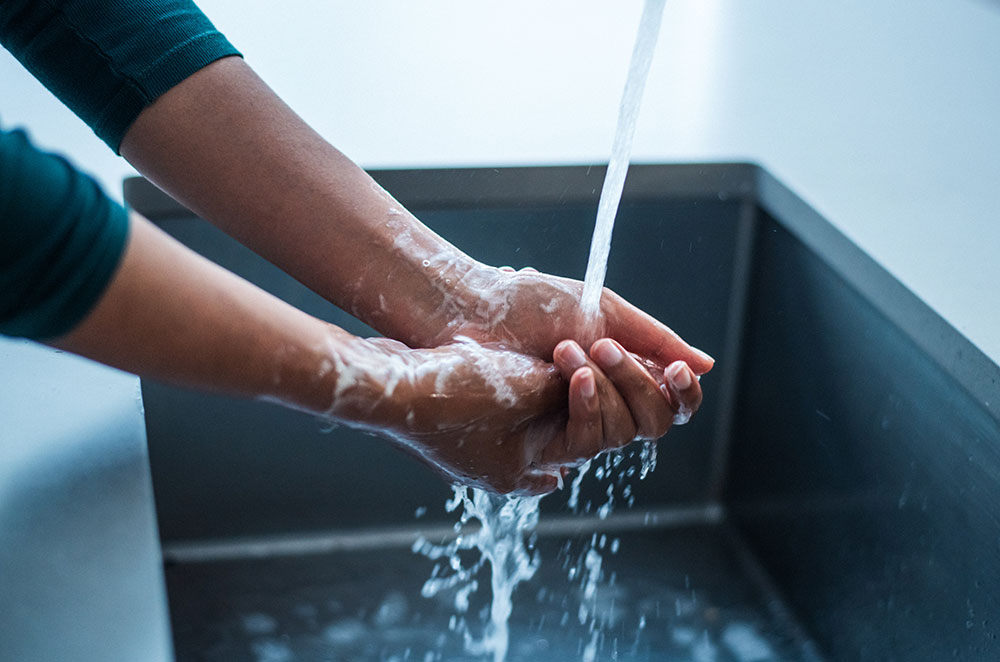 Person washing hands