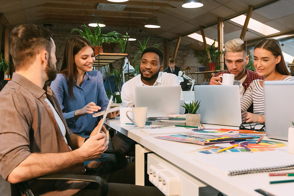 Co-workers in creative meeting