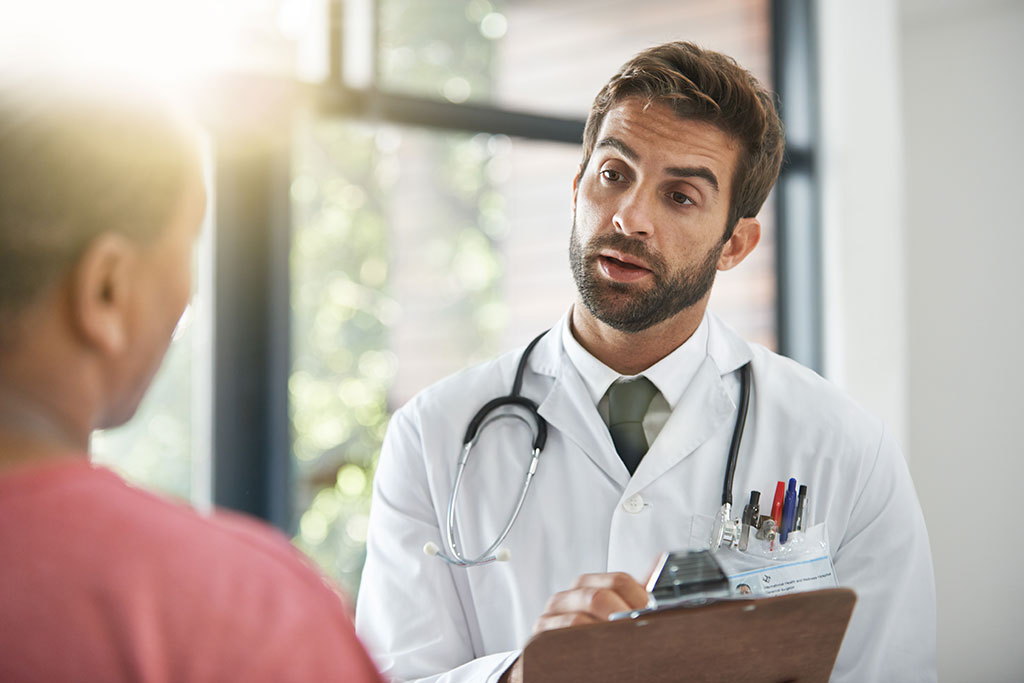 Nurse practitioner talking with patient