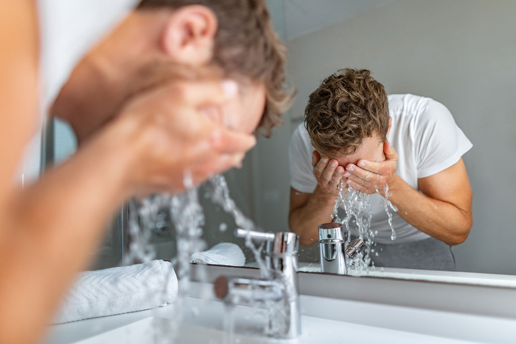 Man washing face