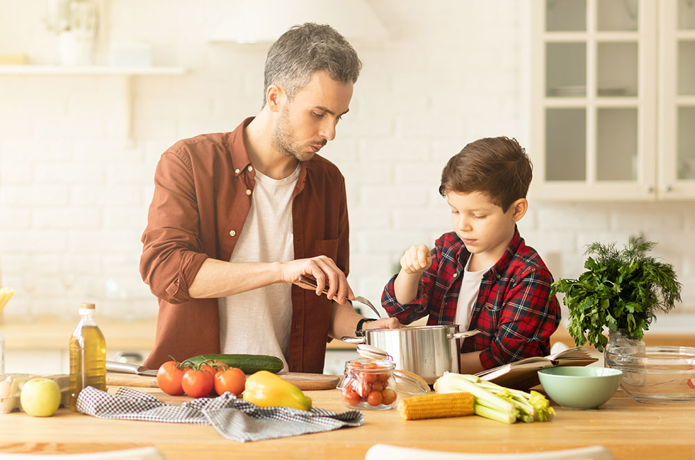 Dad and son cooking