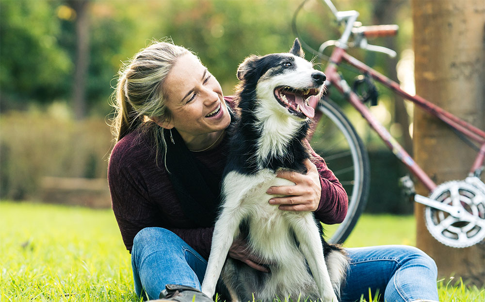 Woman and dog outside