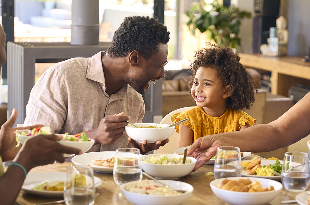 Dad and daughter eating