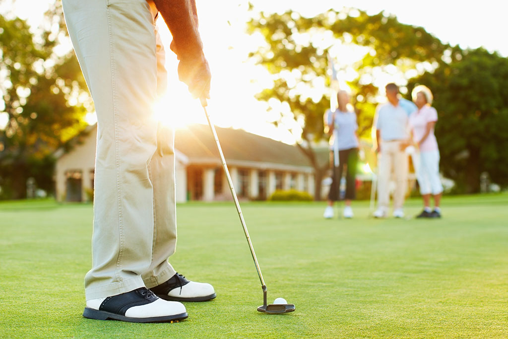 Person golfing