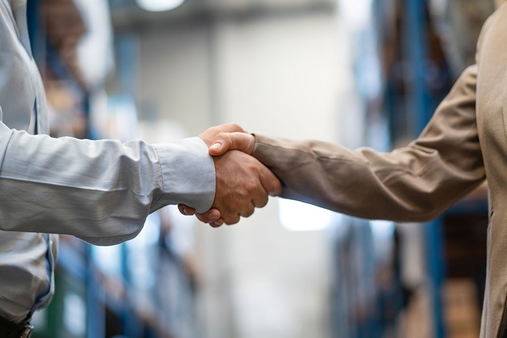 Business people shaking hands