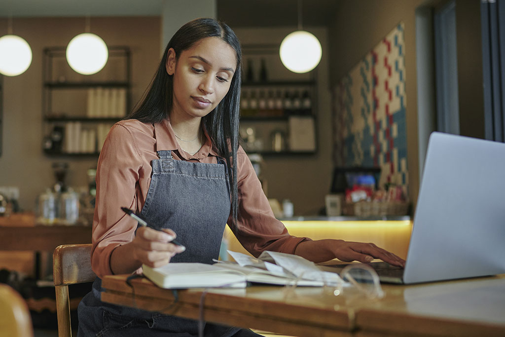 Small business owner going over finances