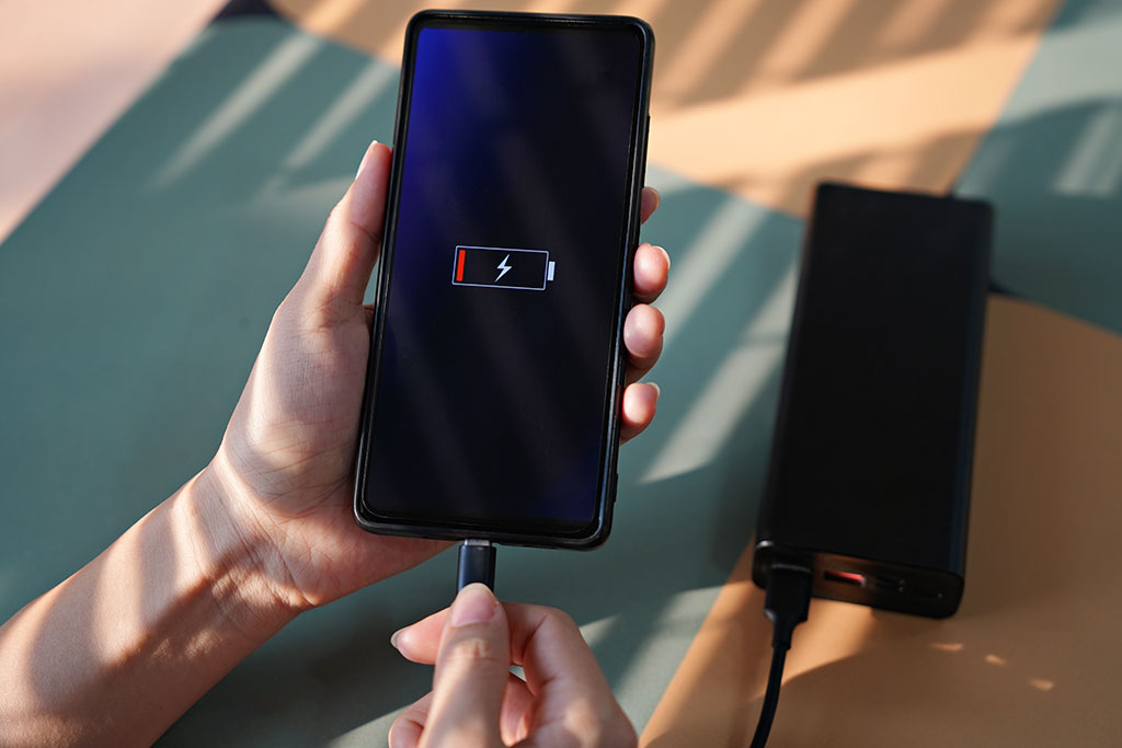 Plugging phone into portable charger