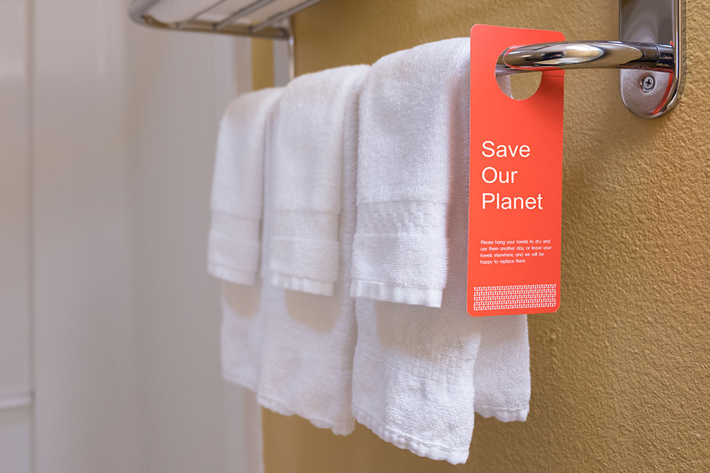 Save our planet card on hotel towels