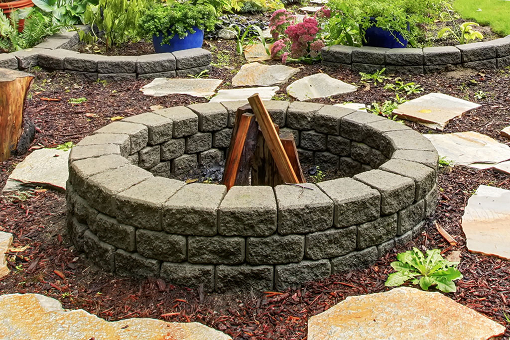 Stone fire pit on mulch