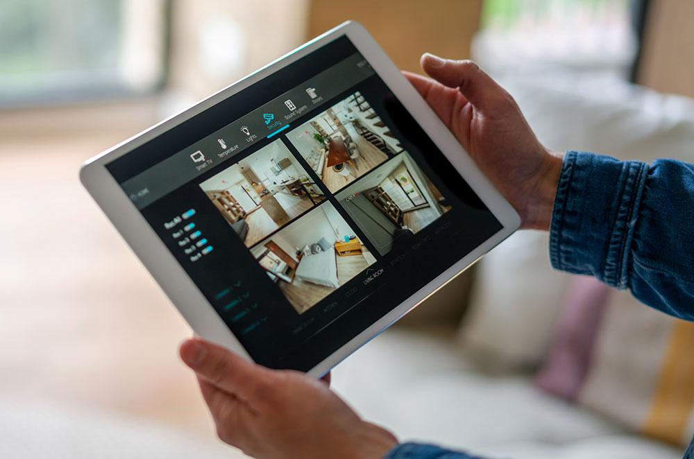 Looking at home security on tablet